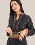 Belt with embroidered and metal accessories